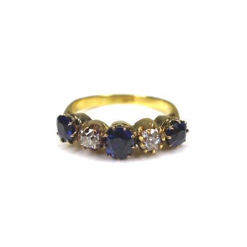 286 - An 18ct gold sapphire and diamond five stone ring, size P/Q, 4.3g.