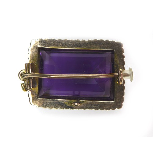 287 - A large amethyst and seed pearl brooch with yellow metal mount, 13.6g overall, the rectangular cut a... 