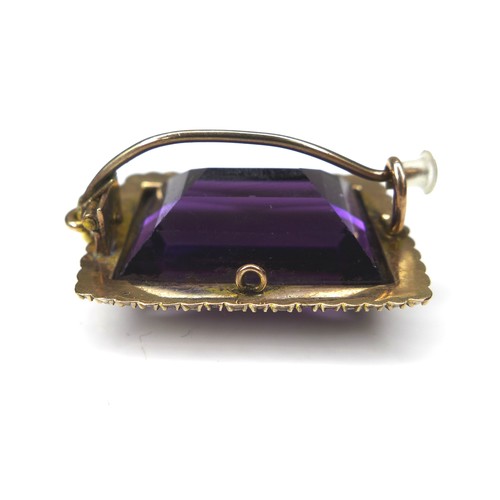 287 - A large amethyst and seed pearl brooch with yellow metal mount, 13.6g overall, the rectangular cut a... 