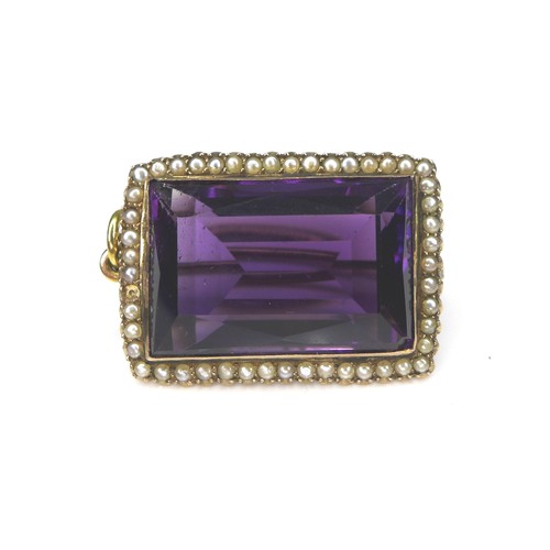 287 - A large amethyst and seed pearl brooch with yellow metal mount, 13.6g overall, the rectangular cut a... 