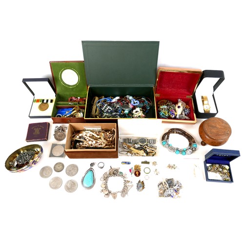 142 - A collection of costume jewellery and wristwatches, together with a number of coins and a WWI victor... 