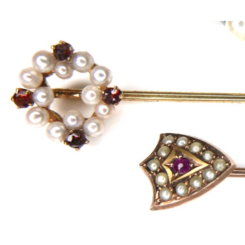 159 - Two pearl mounted stick pins, comprising a 9ct gold ruby and pearl stick pin, 0.8g, a yellow metal g... 