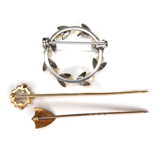 159 - Two pearl mounted stick pins, comprising a 9ct gold ruby and pearl stick pin, 0.8g, a yellow metal g... 