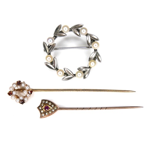 159 - Two pearl mounted stick pins, comprising a 9ct gold ruby and pearl stick pin, 0.8g, a yellow metal g... 