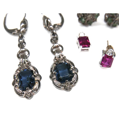 167 - A collection 9ct gold and other earrings, comprising a two tear drop sapphire and white stone drop e... 