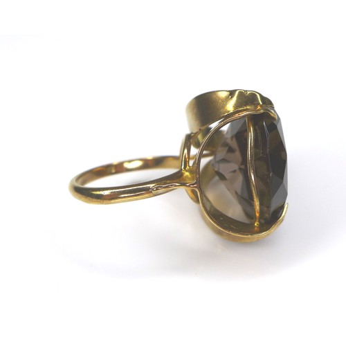 169 - A 9ct gold smoky quartz ring, size M, 9.1g, together with a diamond, gold and silver ring, size N, 7... 