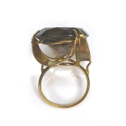 169 - A 9ct gold smoky quartz ring, size M, 9.1g, together with a diamond, gold and silver ring, size N, 7... 