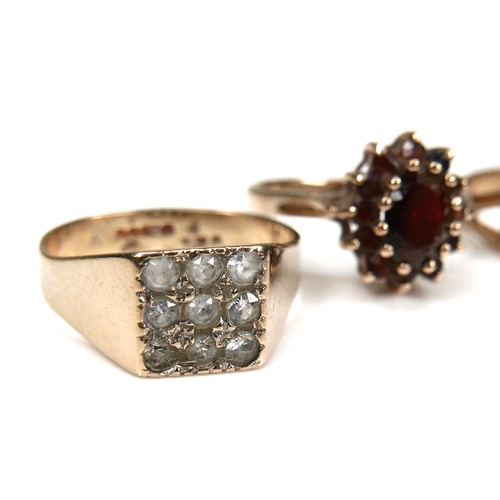 232 - Five 9ct gold rings, comprising a red stone cluster ring, size L, 2.4g, a blue and white stone clust... 