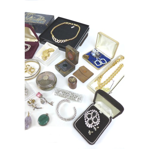 141 - A collection of costume Jewellery including some silver, bangles, brooches, necklaces, and some ring... 