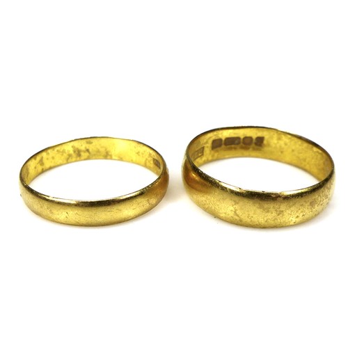 262 - Two 18ct gold wedding rings, the smaller size O, 4mm wide, the larger size Q, 5.5mm wide, 5.8g combi... 