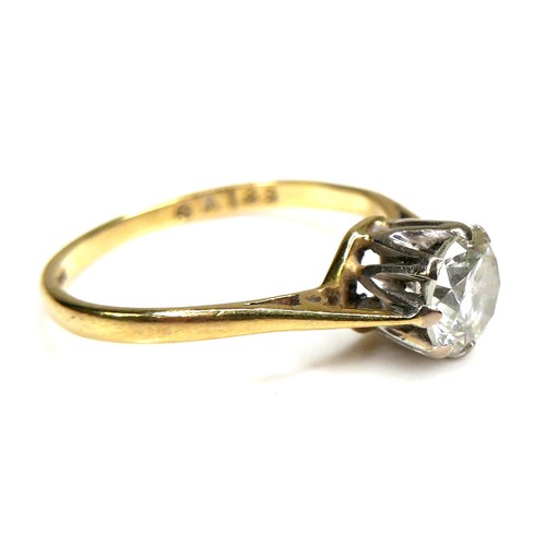 297 - An 18ct yellow gold diamond solitaire ring, the round brilliant cut stone, 6.0 by 3.5mm, approximate... 