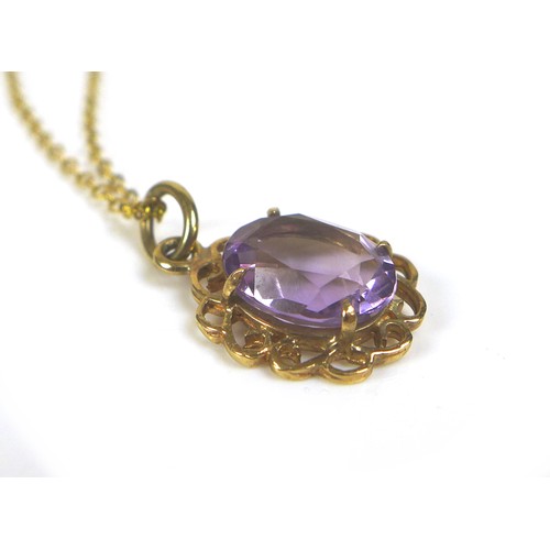 223 - Two 9ct gold pendant necklaces, comprising an amethyst pendant with 9t gold mount and yellow metal c... 