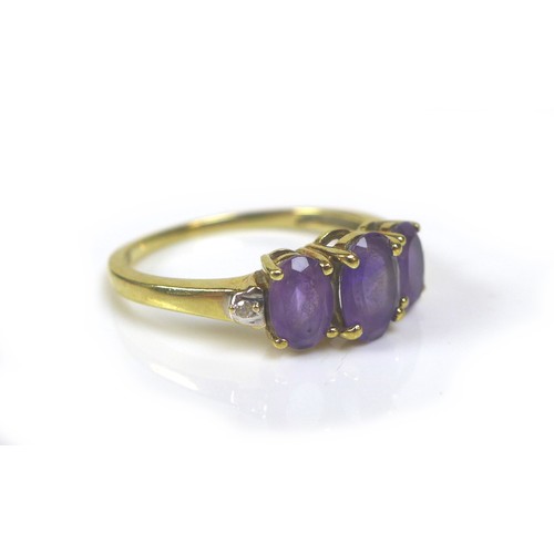 175 - Three 9ct gold dress rings, comprising an pale amethyst style ring, its rectangular stone 14 by 10mm... 