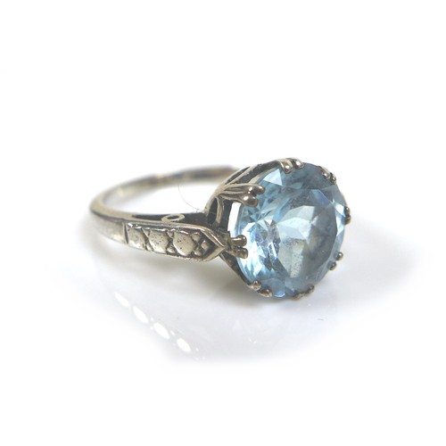 218 - Five dress silver and gem stone dress rings, comprising a blue sapphire and white stone ring, oval c... 