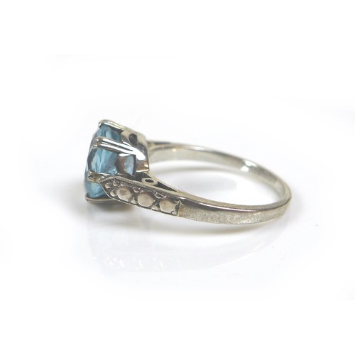 218 - Five dress silver and gem stone dress rings, comprising a blue sapphire and white stone ring, oval c... 