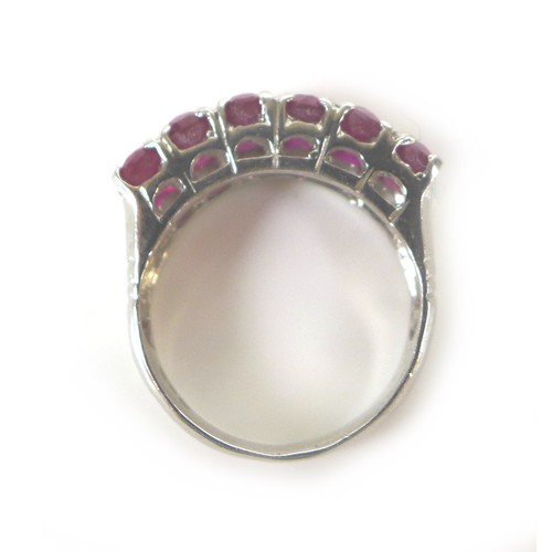 218 - Five dress silver and gem stone dress rings, comprising a blue sapphire and white stone ring, oval c... 