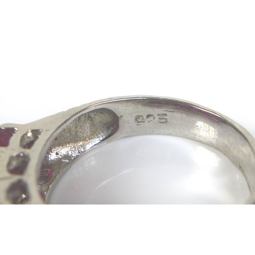 218 - Five dress silver and gem stone dress rings, comprising a blue sapphire and white stone ring, oval c... 