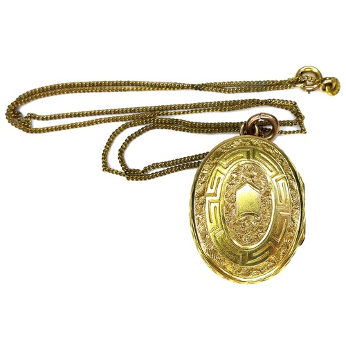 268 - A group of three pendant necklaces, comprising a yellow gold oval locket with engraved decoration, 2... 