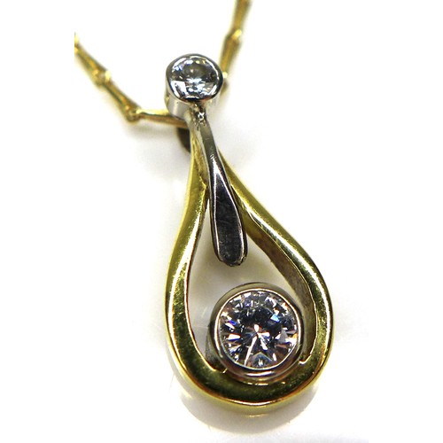 273 - An 18ct yellow gold pendant necklace, the teardrop shaped pendant with a suspended brilliant cut dia... 