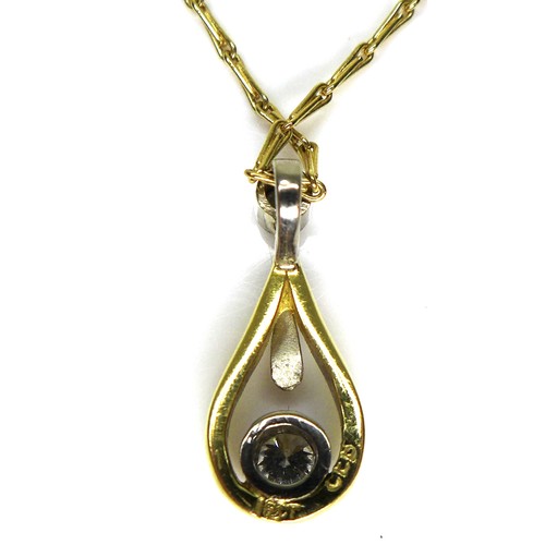 273 - An 18ct yellow gold pendant necklace, the teardrop shaped pendant with a suspended brilliant cut dia... 