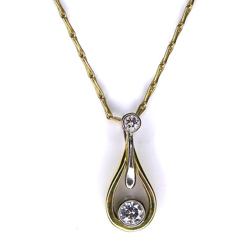 273 - An 18ct yellow gold pendant necklace, the teardrop shaped pendant with a suspended brilliant cut dia... 