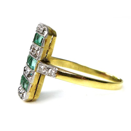 283 - An 18ct yellow gold ring, set with diamonds and emeralds in seven alternating rows within a rectangu... 