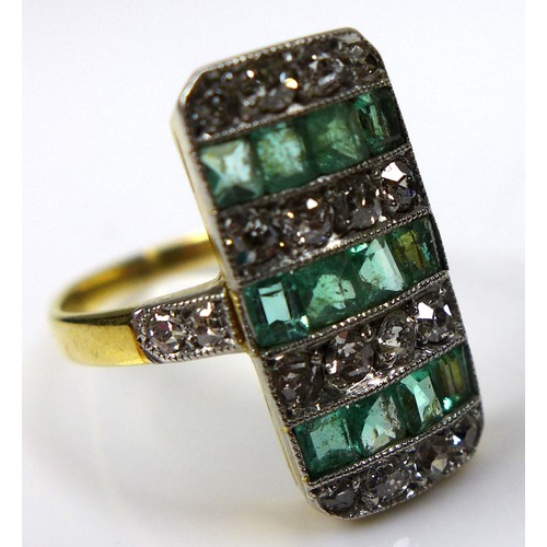 283 - An 18ct yellow gold ring, set with diamonds and emeralds in seven alternating rows within a rectangu... 