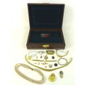 A small group of costume jewellery, including a faux pearl necklace, a gold plated fringe necklace, ... 