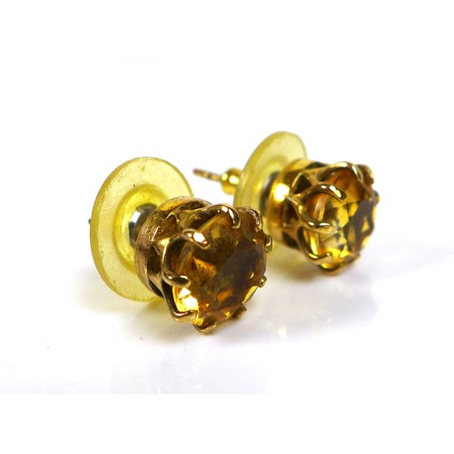 252 - A pair of 9ct gold citrine earrings, each round cut citrine approximately 8mm, 3g overall. (1 bag)