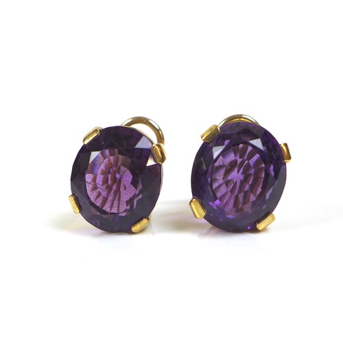 254 - A pair of 9ct gold mounted amethyst clip-on earrings, the oval cut amethysts, each approximately 12 ... 