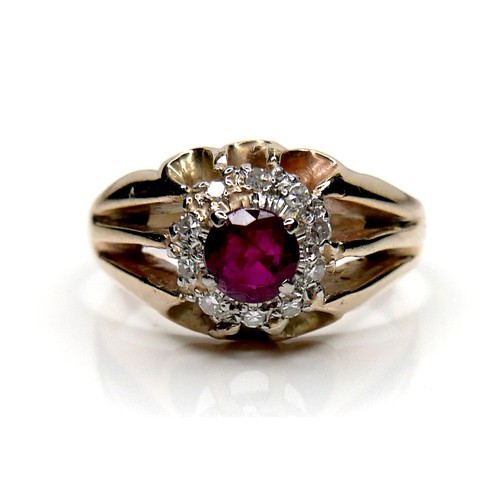 204 - A 9ct yellow ring ring, set with an older mounting centred by a 5.0mm ruby surrounded by diamonds, s... 