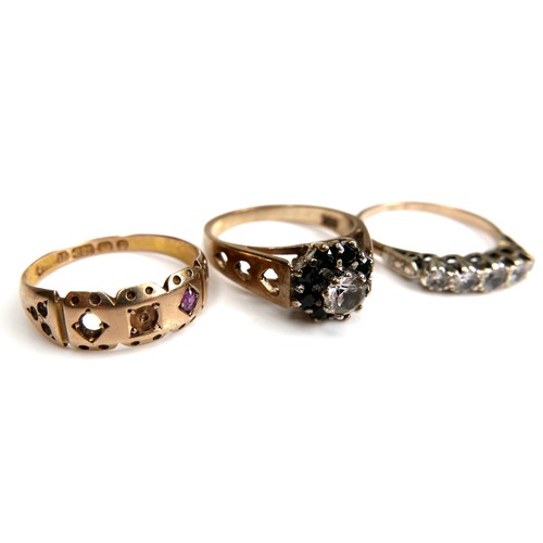 211 - A group of three yellow gold rings, comprising a Victorian 15ct gold ring set with one ruby, a/f mis... 