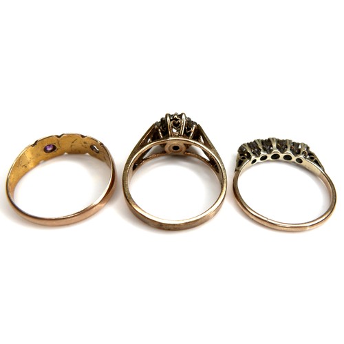 211 - A group of three yellow gold rings, comprising a Victorian 15ct gold ring set with one ruby, a/f mis... 