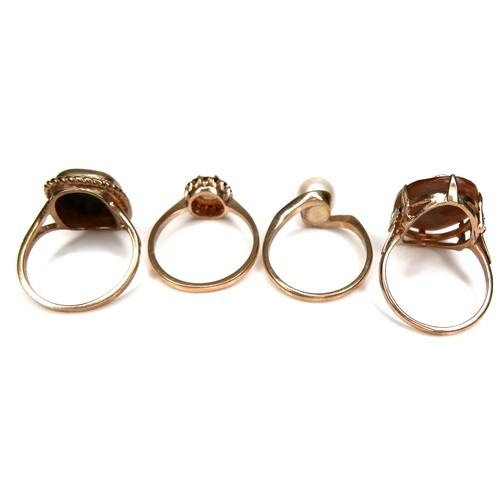 212 - A group of four 9ct gold rings, two set with pearls, both size M/N, 2.0g and 2.7g, an obsidian signe... 