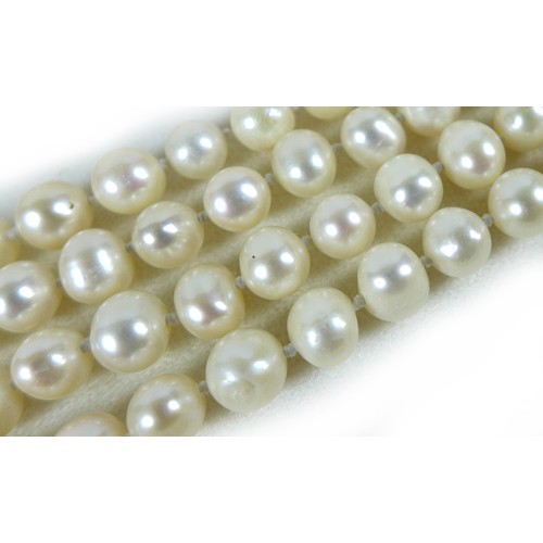 156 - A group of three 'flapper' pearl necklaces, all with no clasps, misshapen but mainly round pearls, t... 