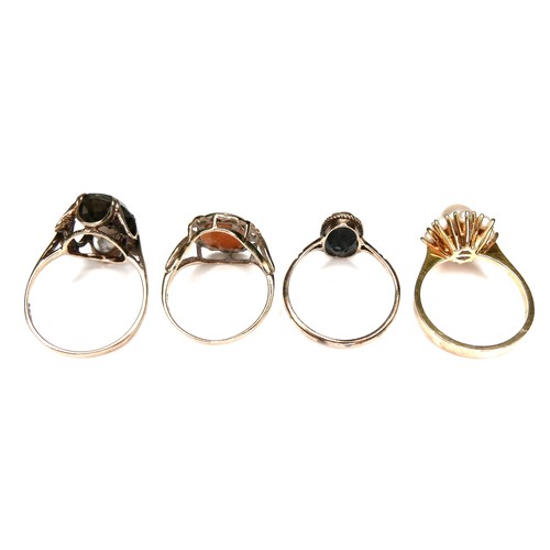 187 - Four 9ct gold dress rings, comprising a cameo ring, size K/L, a black opal style ring, the oval ston... 