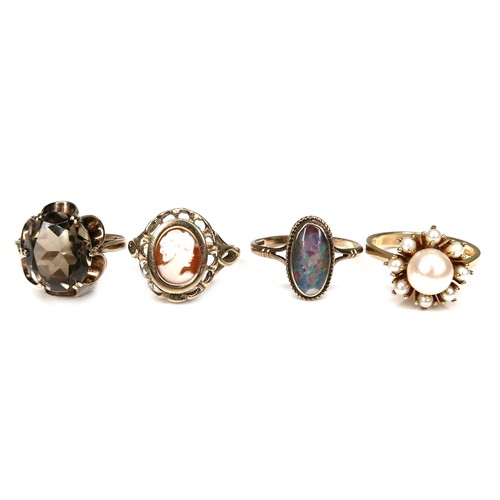 187 - Four 9ct gold dress rings, comprising a cameo ring, size K/L, a black opal style ring, the oval ston... 