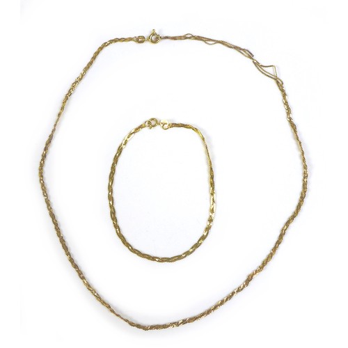 174 - A group of 9ct gold jewellery, comprising a flat chain necklace 39.5cm long, similar style bracelet,... 