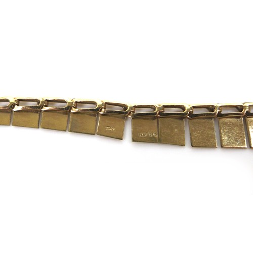 165 - A yellow metal Cleopatra style necklace, with graduated rectangular panels, bearing an indistinct ma... 