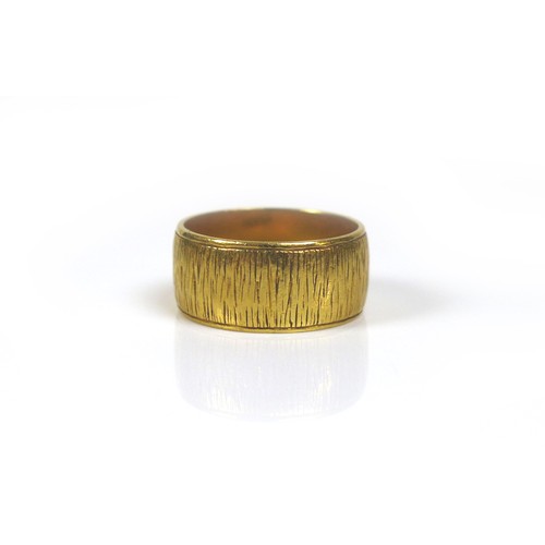 253 - An 18ct gold band ring, size N, 7.7g.