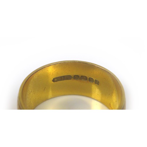 253 - An 18ct gold band ring, size N, 7.7g.