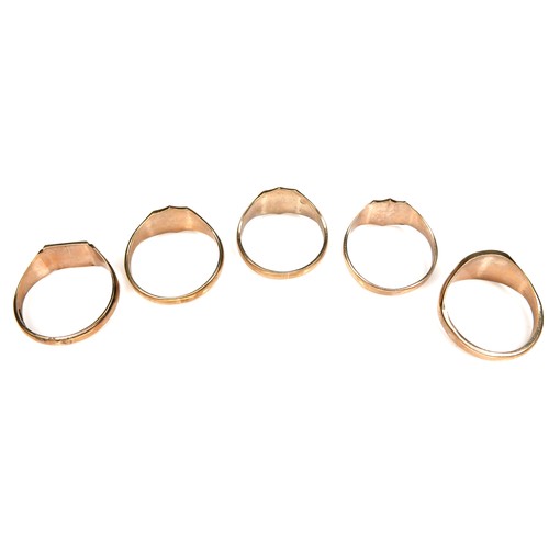 277 - A group of five 9ct yellow gold signet rings, with engraved decoration, 9.9 to 12.8mm wide, sizes V ... 