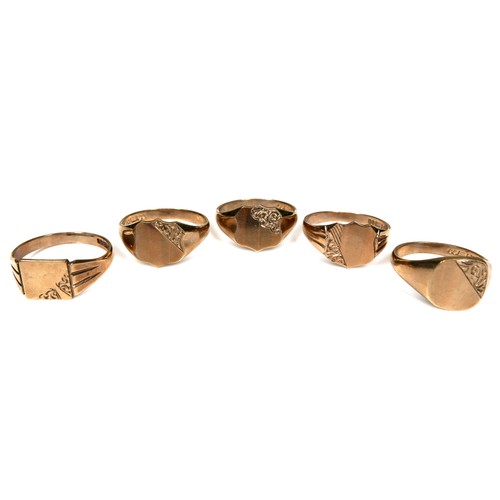 277 - A group of five 9ct yellow gold signet rings, with engraved decoration, 9.9 to 12.8mm wide, sizes V ... 