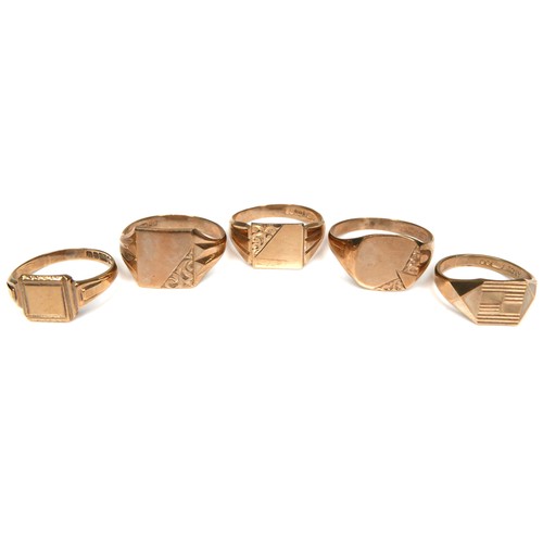 264 - A group of five 9ct yellow gold signet rings, with engraved decoration, 8.8 to 12.0mm wide, sizes L ... 