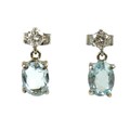 A pair of aquamarine and diamond drop earrings, with oval faceted cut aquamarines, each 0.72ct, 7.8 ... 