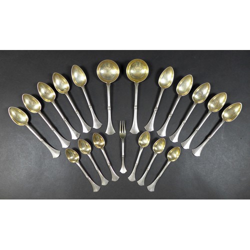 50 - A collection of Russian white metal flatware, stamped 'Женева' (Geneva) and '84' suggesting 875 grad... 