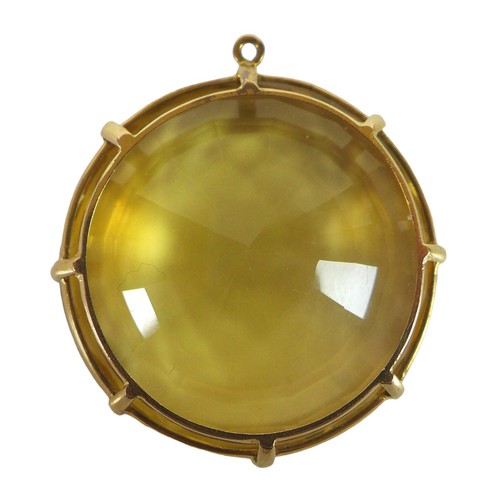 166 - A yellow metal pendant, with a round faceted citrine, in a double bale eight claw setting, 12 by 36m... 