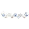 A group of nine 20th century British and Oriental teapots, including two Japanese blue and white tea... 