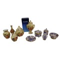 A collection of Aynsley Imperial and Orchard Gold pieces, included a lidded, twin handled vase, boxe... 