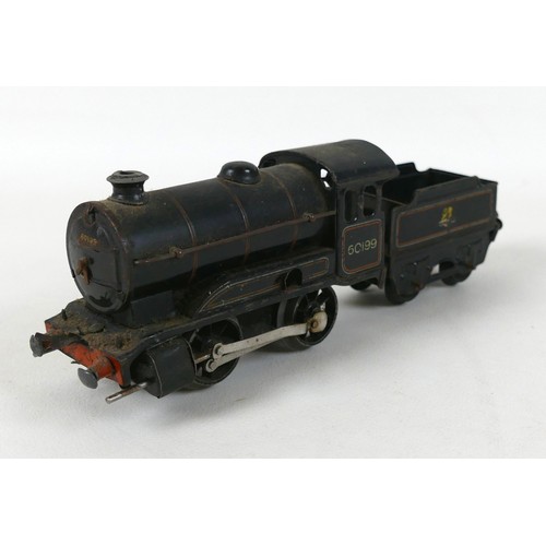 91 - A Hornby O gauge tinplate train set, comprising a 60985 engine, in green livery for British Railways... 